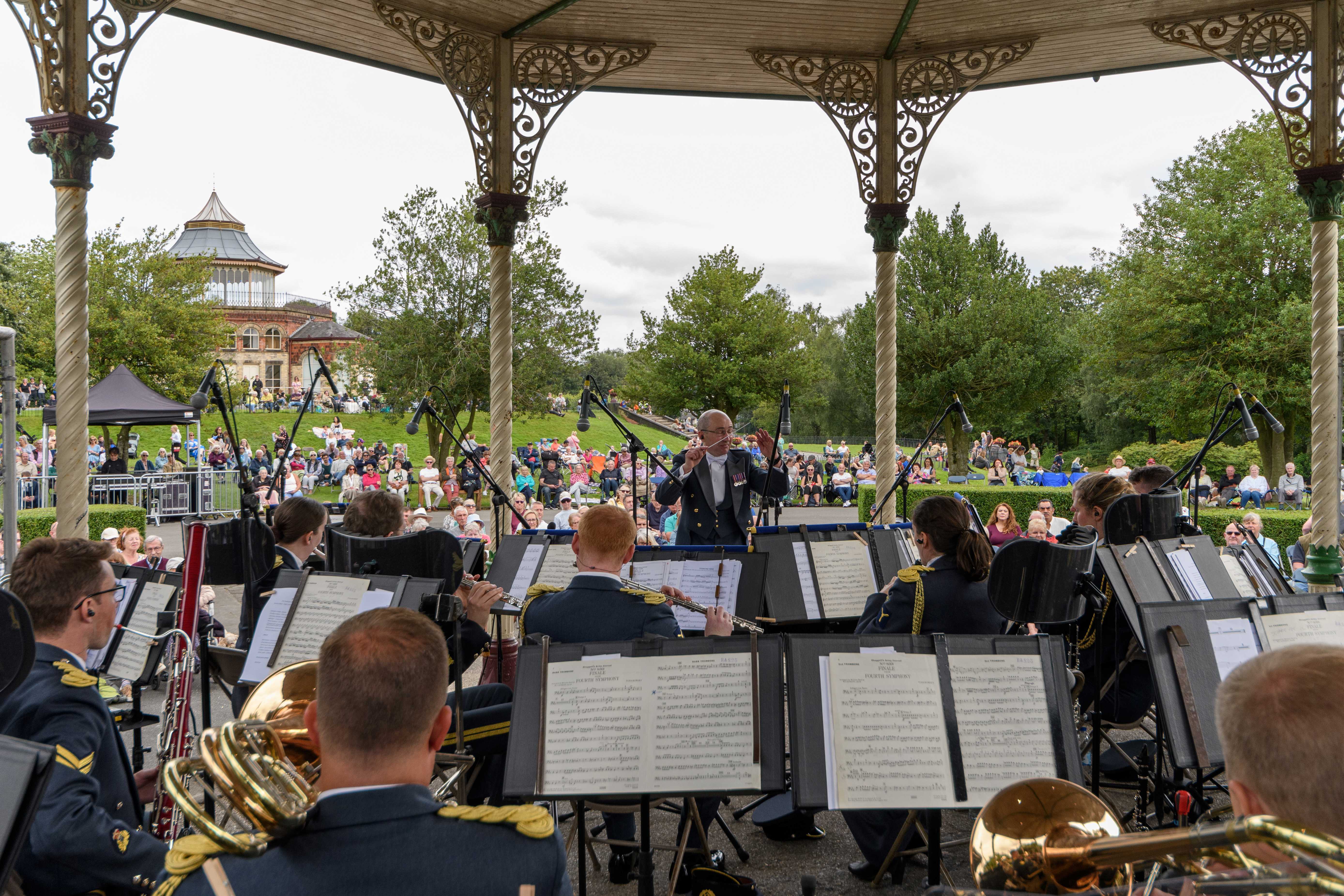 A brass band playing at Mesnes Park bandstand in Wigan A brass band playing at Mesnes Park bandstand in Wigan